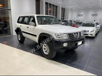 Nissan  Patrol  Safari  2002  SUV  Manual  6  275,500  4WD  White  Gasoline