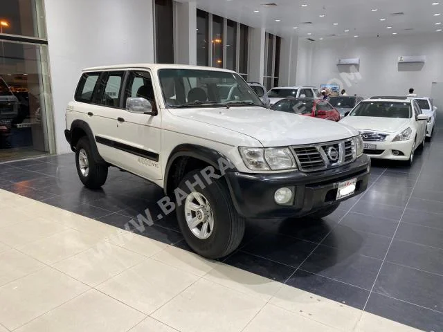 نيسان  باترول  سفاري  2002  اس يو في  عادي  6  275,500  دفع رباعي  أبيض  بنزين