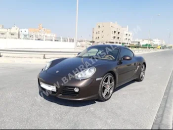 Porsche  Cayman  S  2009  Coupe / Sport  Automatic  6  142,200  RWD  Brown  Gasoline