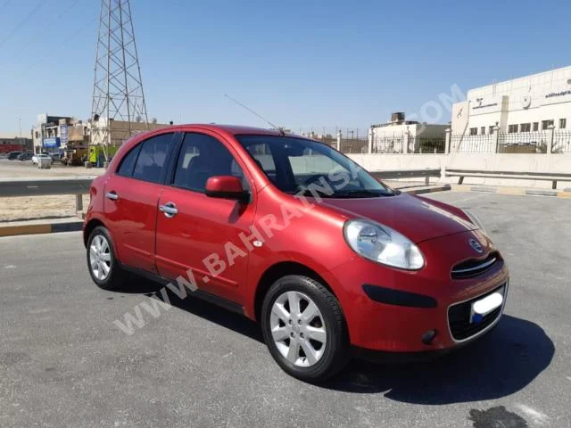 Nissan  Micra  2013  Hatchback  Automatic  4  121,300  FWD  Red  Gasoline