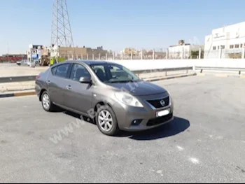Nissan  Sunny  2013  Sedan  Automatic  4  129,600  FWD  Gray  Gasoline