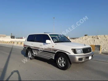 Toyota  Land Cruiser  GXR  2002  SUV  Automatic  6  309,500  RWD  White  Gasoline