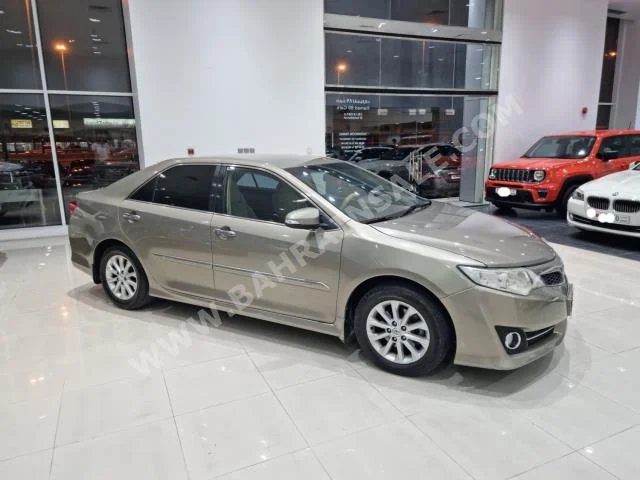 Toyota  Camry  GLX  2012  Sedan  Automatic  4  240,800  FWD  Bronze  Gasoline