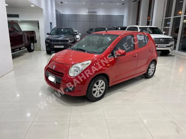 Suzuki  Celerio  2012  Hatchback  Automatic  3  243,500  FWD  Red  Gasoline
