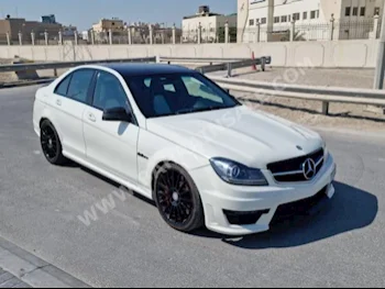 مرسيدس - بنز  سي - كلاس  63 AMG  2009  كوبيه \ سبورت  اتوماتك  8  119,300  دفع خلفي  أبيض  بنزين