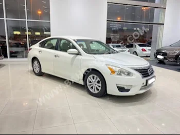 Nissan  Altima  2.5 S  2014  Sedan  Automatic  4  79,300  FWD  White  Gasoline