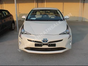 Toyota  Prius  Hybrid  2017  Sedan  Automatic  4  0  FWD  Pearl  Hybrid