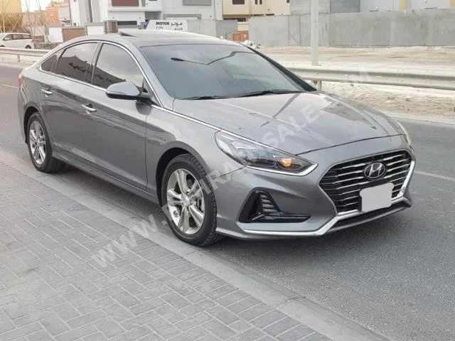 Hyundai  Sonata  2018  Sedan  Automatic  4  33,000  FWD  Gray  Gasoline