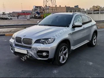 BMW  X-Series  6  2010  SUV  Automatic  8  172,500  4WD  Silver  Gasoline