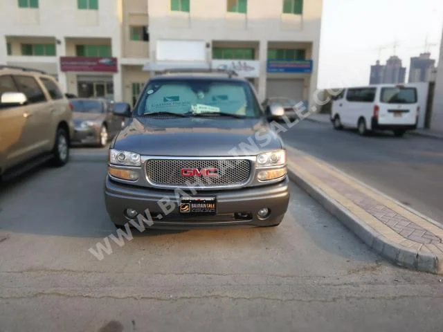 GMC  Yukon  Denali  2006  SUV  Automatic  8  184,000  4WD  Silver  Gasoline
