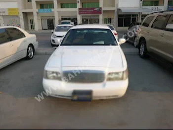 Ford  Crown Victoria  2002  Sedan  Automatic  8  396,000  RWD  White  Gasoline