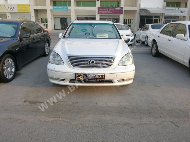 Lexus  LS  430  2005  Sedan  Automatic  8  184,000  4WD  Pearl  Gasoline