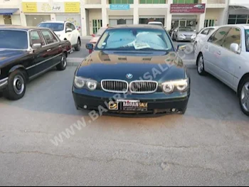 BMW  7-Series  740  2004  Sedan  Automatic  8  84,000  RWD  Green  Gasoline