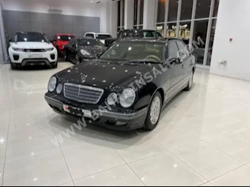 Mercedes-Benz  E-Class  240  2002  Sedan  Automatic  6  260,300  RWD  Black  Gasoline