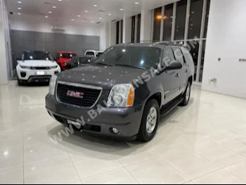 GMC  Yukon  2010  SUV  Automatic  8  140,850  4WD  Gray  Gasoline