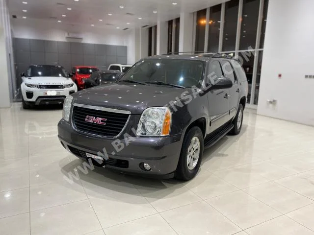 GMC  Yukon  2010  SUV  Automatic  8  140,850  4WD  Gray  Gasoline