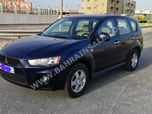 Mitsubishi  Outlander  2010  SUV  Automatic  4  182,400  4WD  Black  Gasoline