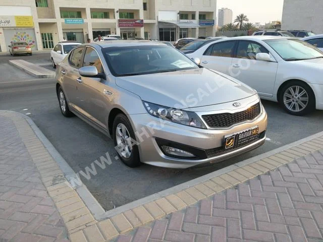 Kia  Optima  2013  Sedan  Automatic  4  44,000  FWD  Silver  Gasoline
