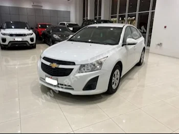 Chevrolet  Cruze  LS  2015  Sedan  Automatic  4  64,300  FWD  White  Gasoline
