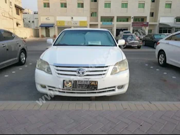 Toyota  Avalon  Limited  2006  Sedan  Automatic  6  209  FWD  Pearl  Gasoline