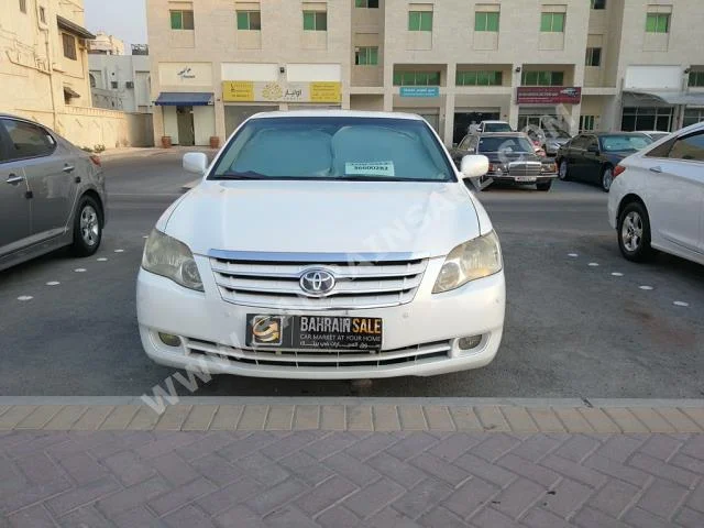 Toyota  Avalon  Limited  2006  Sedan  Automatic  6  209  FWD  Pearl  Gasoline