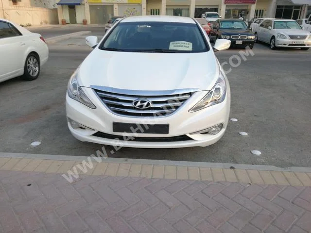 Hyundai  Sonata  2014  Sedan  Automatic  4  32,000  FWD  White  Gasoline