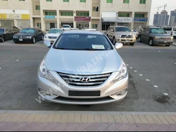 Hyundai  Sonata  2014  Sedan  Automatic  4  32,000  FWD  Silver  Gasoline
