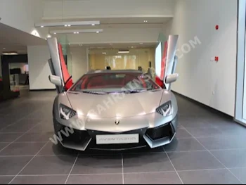 Lamborghini  Aventador  LP700-4  2014  Coupe / Sport  F-1  12  12,000  AWD  Gray  Gasoline