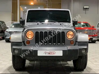 Jeep  Wrangler  Sahara  2013  SUV  Automatic  6  186,000  4WD  Silver  Gasoline