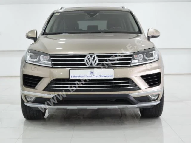 Volkswagen  Touareg  2016  SUV  Automatic  6  33,075  RWD  Gold  Gasoline