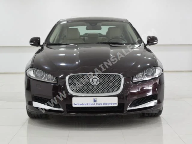 Jaguar  XF  2012  Sedan  Automatic  6  89,178  RWD  Maroon  Gasoline
