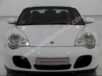 بورش  911  كاريرا اس  2004  كشف  اتوماتك  6  56,882  دفع خلفي  أبيض  بنزين