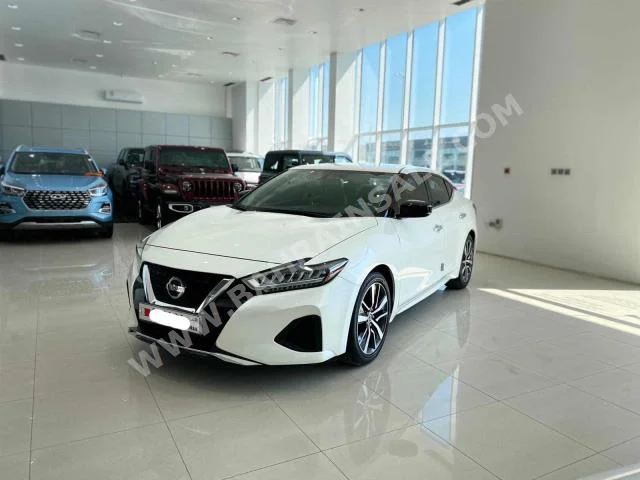 Nissan  Maxima  2020  Sedan  Automatic  6  25,000  RWD  White  Gasoline