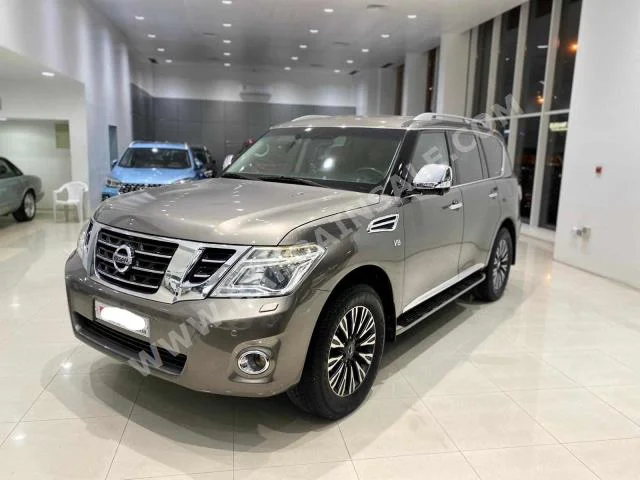 Nissan  Patrol  Platinum  2015  SUV  Automatic  8  122,400  4WD  Gray  Gasoline