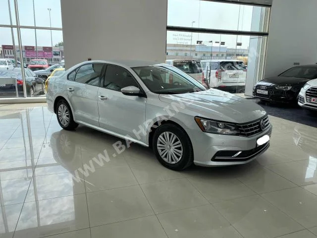 Volkswagen  Passat  2018  Sedan  Automatic  5  64,400  RWD  Silver  Gasoline