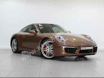 بورش  911  كاريرا اس  2013  كوبيه \ سبورت  اتوماتك  6  29,500  دفع خلفي  بني  بنزين