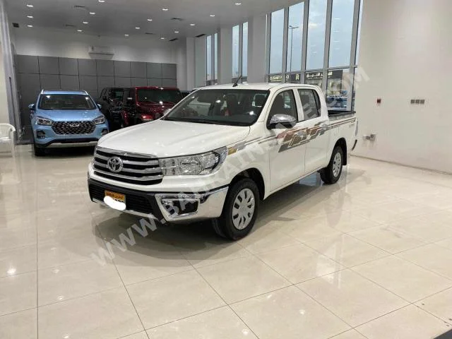 Toyota  Hilux  2018  Pick Up  Manual  4  52,900  FWD  White  Gasoline