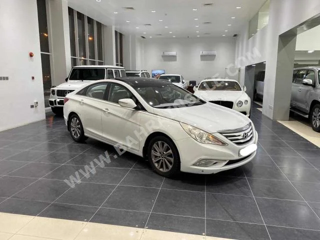 Hyundai  Sonata  2014  Sedan  Automatic  4  153,400  FWD  White  Gasoline