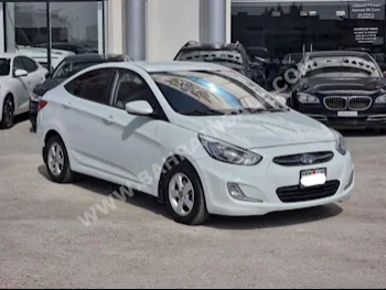 Hyundai  Accent  1.6  2017  Sedan  Automatic  4  112,100  FWD  White  Gasoline