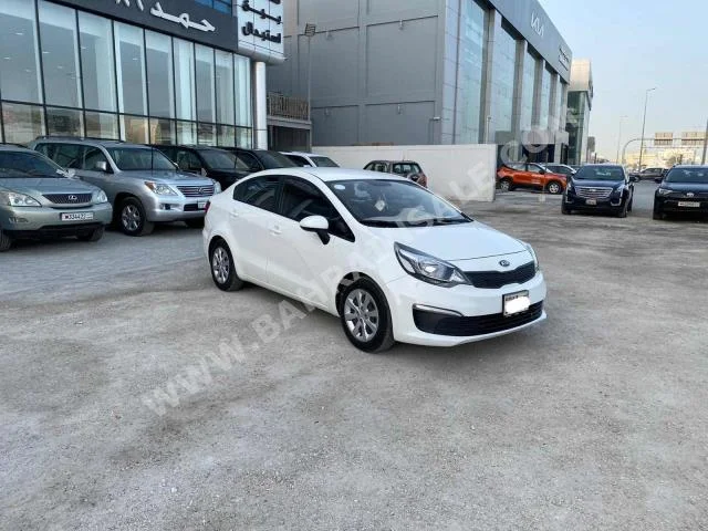 Kia  Rio  2016  Sedan  Automatic  4  93,400  FWD  White  Gasoline