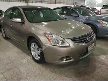 Nissan  Altima  2.5 S  2011  Sedan  Automatic  4  79,000  FWD  Light Brown  Gasoline