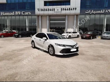 Toyota  Camry  GLE  2019  Sedan  Automatic  4  42,500  FWD  White  Gasoline