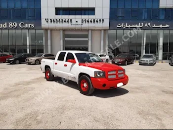 Dodge  Pickup  2005  Pick Up  Automatic  8  100,900  RWD  White  Gasoline