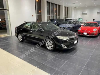 Toyota  Camry  GLX  2015  Sedan  Automatic  4  82,900  FWD  Black  Gasoline