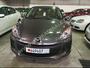 Mazda  Mazda 3  2013  Sedan  Automatic  4  82,000  FWD  Gray  Gasoline