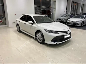 Toyota  Camry  LE  2019  Sedan  Automatic  4  49,450  FWD  White  Gasoline