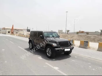 Jeep  Wrangler  Sahara  2018  SUV  Automatic  6  65,300  RWD  Gray  Gasoline