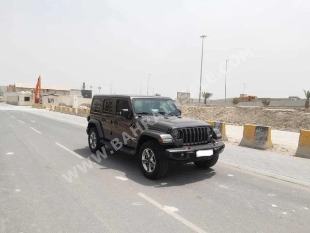 Jeep  Wrangler  Sahara  2018  SUV  Automatic  6  65,300  RWD  Gray  Gasoline