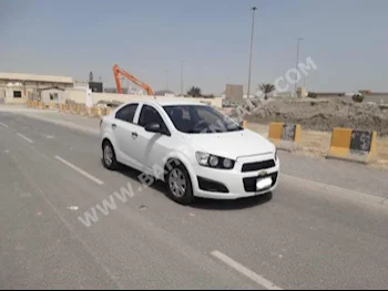 Chevrolet  Sonic  2013  Sedan  Automatic  4  114,600  FWD  White  Gasoline