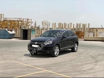 فوكس واغن  طوارق  2014  اس يو في  اتوماتك  6  108,650  دفع خلفي  أسود  بنزين